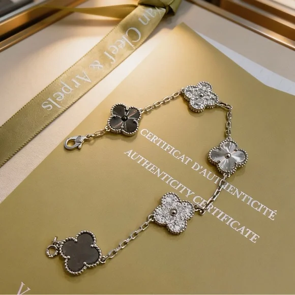 Van Cleef & Arpels Silver and Black Floral Bracelet